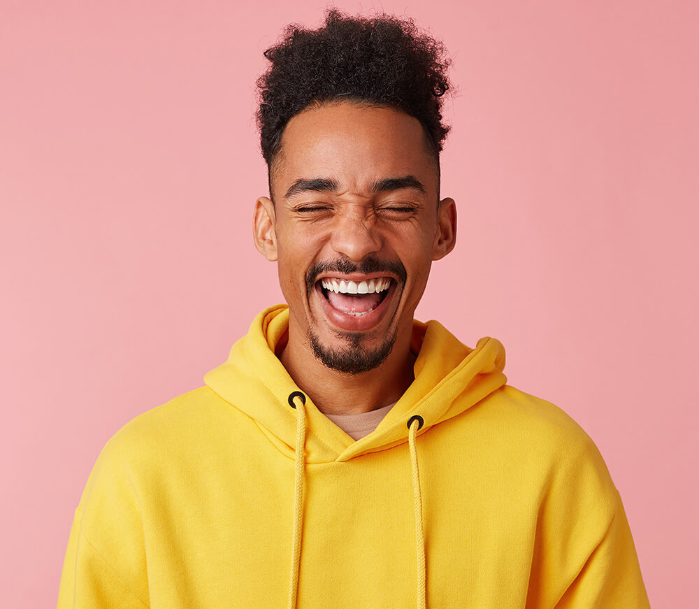 A young man smiling